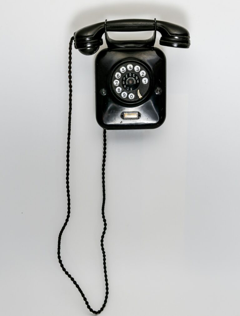 Old fashioned style black telephone - Get in touch with Sally